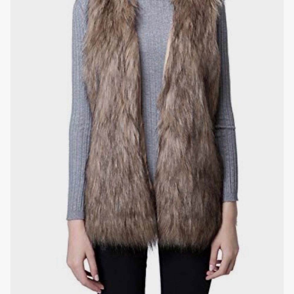 Barneys NY Faux Fur Reversible Vest. Warm and soft. Host pick! Best in show.